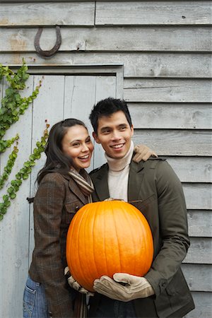 Portrait of Couple With Pumpkin Stock Photo - Rights-Managed, Code: 700-00683432