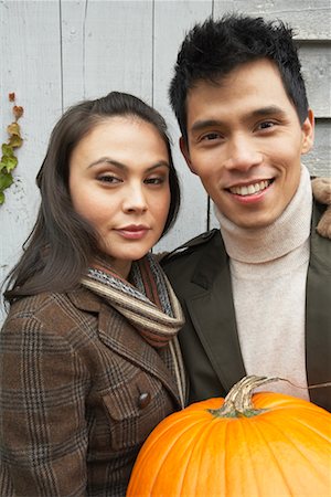 Portrait of Couple With Pumpkin Stock Photo - Rights-Managed, Code: 700-00683433