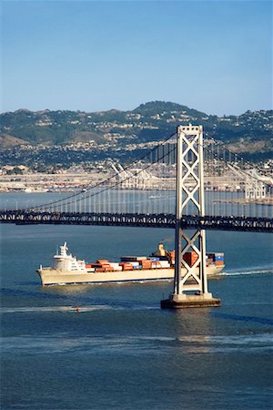 simsearch:600-03178374,k - Ship Passing Under The Bay Bridge, San Francisco, California, USA Stock Photo - Rights-Managed, Code: 700-00695583