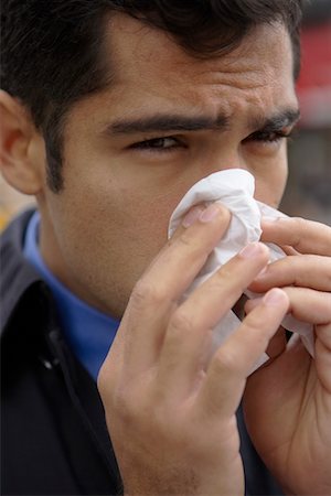 Man Blowing Nose Stock Photo - Rights-Managed, Code: 700-00695765