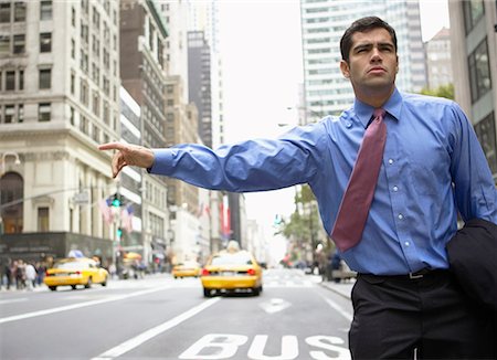 Businessman Hailing a Cab, New York, New York, USA Foto de stock - Con derechos protegidos, Código: 700-00695785