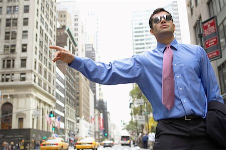 Businessman Hailing a Cab, New York, New York, USA Stock Photo - Rights-Managed, Code: 700-00695783