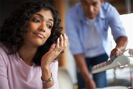 Man Passing Adding Machine to Woman Stock Photo - Rights-Managed, Code: 700-00695848