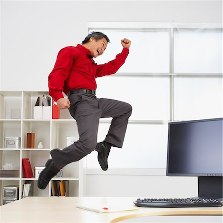 simsearch:700-00546285,k - Businessman Jumping in the Air Stock Photo - Rights-Managed, Code: 700-00711450
