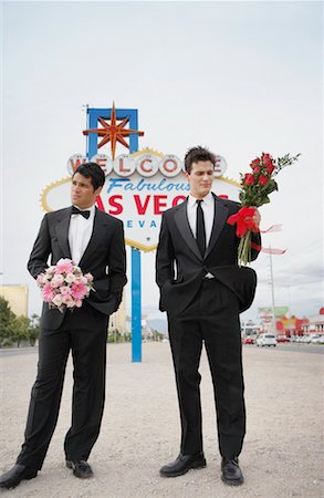 simsearch:700-00711853,k - Hommes en tenues de soirée par signe, Las Vegas, Nevada, USA Photographie de stock - Rights-Managed, Code: 700-00711847