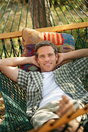 Man Lying in Hammock Stock Photo - Rights-Managed, Code: 700-00747973