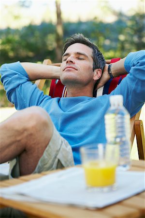 sleeping backyard - Man Relaxing Outdoors Stock Photo - Rights-Managed, Code: 700-00747984