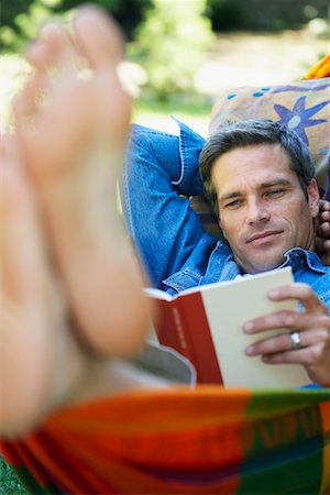 simsearch:700-00823632,k - Man Reading Outdoors Stock Photo - Rights-Managed, Code: 700-00747996