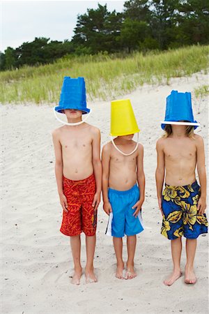 simsearch:632-01156987,k - Boys With Buckets Over Heads Stock Photo - Rights-Managed, Code: 700-00748015