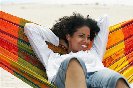 Woman Lying in Hammock Stock Photo - Rights-Managed, Code: 700-00748157