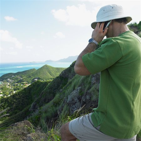 Man Talking on Cellular Phone, Oahu, Hawaii Stock Photo - Rights-Managed, Code: 700-00748254