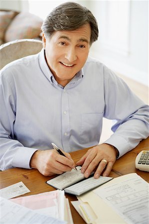 Man doing Personal Finances Stock Photo - Rights-Managed, Code: 700-00748286
