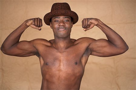simsearch:700-00897661,k - Man Flexing Muscles Stock Photo - Rights-Managed, Code: 700-00748449