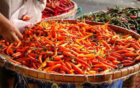 person with hot pepper - Peppers at Market Stock Photo - Rights-Managed, Code: 700-00748480