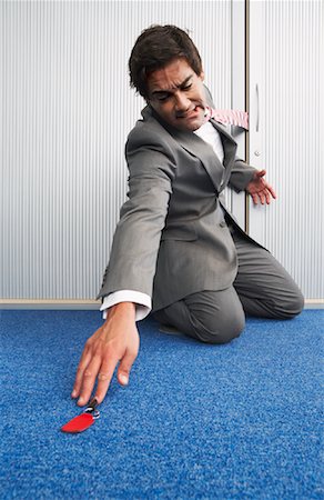 Businessman with Necktie Caught in Door Foto de stock - Con derechos protegidos, Código: 700-00748517