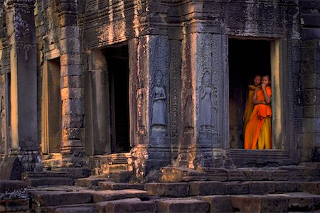 Monks In Doorway, Angkor Thom, Cambodia Stock Photo - Rights-Managed, Code: 700-00768067
