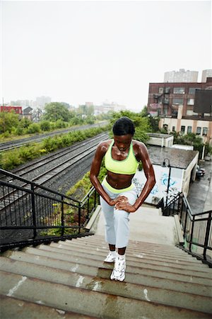 sweating running - Woman Exercising on Stairs Stock Photo - Rights-Managed, Code: 700-00768108