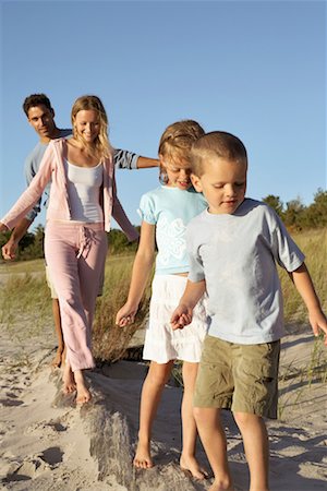 Family Balancing on Driftwood Stock Photo - Rights-Managed, Code: 700-00768244