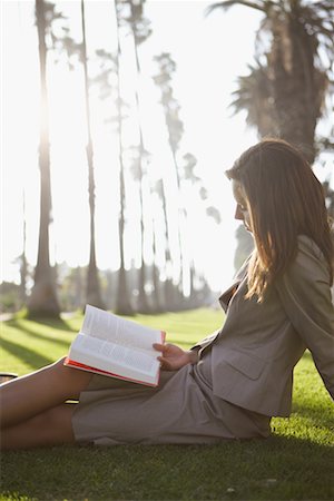 Businesswoman Reading Outdoors Stock Photo - Rights-Managed, Code: 700-00768340