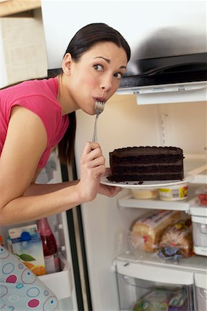 simsearch:600-01036940,k - Woman Eating Cake Foto de stock - Con derechos protegidos, Código: 700-00787002