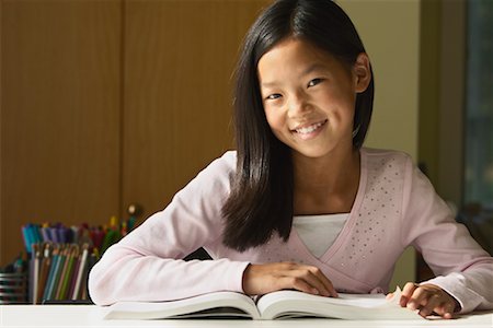 Girl Reading Book Stock Photo - Rights-Managed, Code: 700-00782121