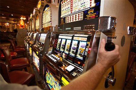 slot casino interior - Person Playing Slot Machines at Casino, Las Vegas, Nevada, USA Stock Photo - Rights-Managed, Code: 700-00782394