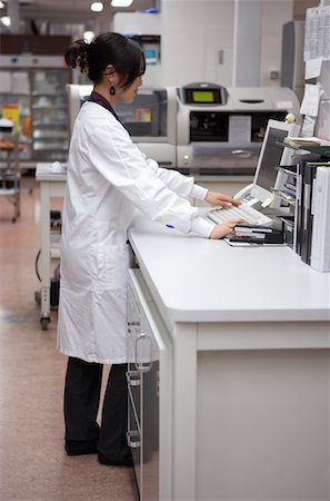 Lab Technician Using Computer Stock Photo - Rights-Managed, Code: 700-00782438
