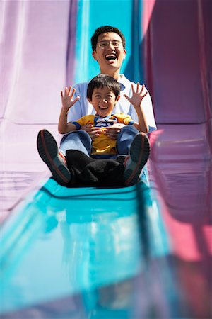 Father and Son on Slide Stock Photo - Rights-Managed, Code: 700-00782598