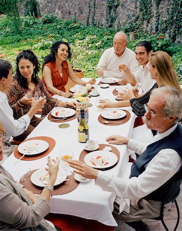 picture of family celebration meal in a dinner party - People at Dinner Party Outdoors Stock Photo - Rights-Managed, Code: 700-00795369