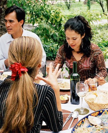 ethnic family at restaurant - People at Dinner Party Stock Photo - Rights-Managed, Code: 700-00795374