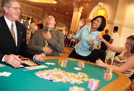 simsearch:6122-07697873,k - People Playing Poker at Casino, Las Vegas, Nevada Stock Photo - Rights-Managed, Code: 700-00795478