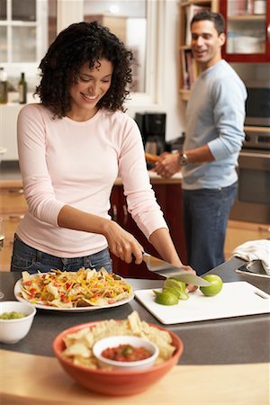 simsearch:700-01579466,k - Couple in Kitchen Stock Photo - Rights-Managed, Code: 700-00796232