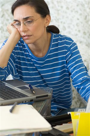 simsearch:700-00814372,k - Bored Woman Working Stock Photo - Rights-Managed, Code: 700-00814373
