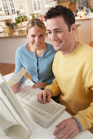 simsearch:600-01041567,k - Couple Working on Computer Foto de stock - Con derechos protegidos, Código: 700-00847201