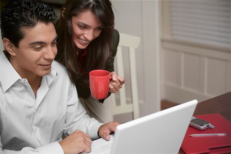 Couple Using Laptop Computer Stock Photo - Rights-Managed, Code: 700-00847309