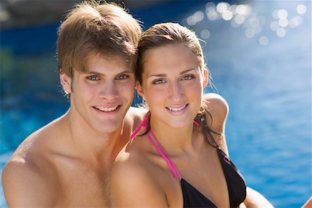 simsearch:700-00056071,k - Jeune couple au bord de la piscine Photographie de stock - Rights-Managed, Code: 700-00847438