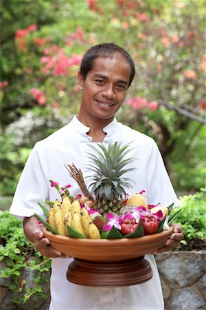 food platter presentation - Portrait of Waiter With Bowl of Fruit Stock Photo - Rights-Managed, Code: 700-00847562