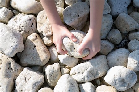 Picking Stone, Manzanita, Tillamook County, Oregon, USA - Stock