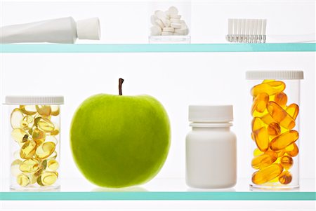 Apple in Medicine Cabinet Stock Photo - Rights-Managed, Code: 700-00847912