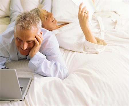 Couple Lying on Bed Stock Photo - Rights-Managed, Code: 700-00848120