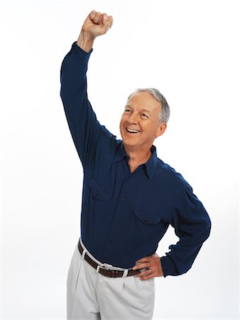 Man Pumping Fist in Air Stock Photo - Rights-Managed, Code: 700-00848584