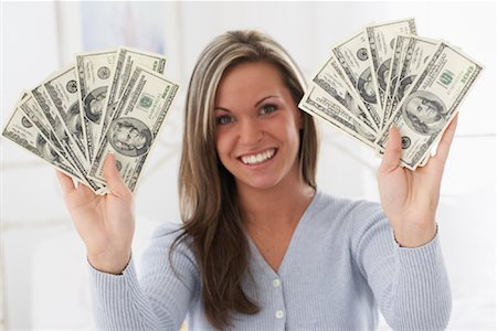 Woman Holding Cash Stock Photo - Rights-Managed, Code: 700-00865040
