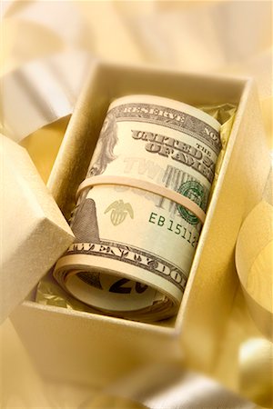 Rolled up Money in Gift Box Stock Photo - Rights-Managed, Code: 700-00865247