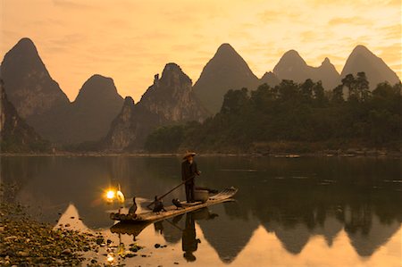Cormorant Fisherman, Li Jiang River, Yangshuo, Guangxi Province, China Stock Photo - Rights-Managed, Code: 700-00865304