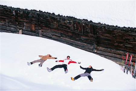 Three Friends Making Snow Angels Stock Photo - Rights-Managed, Code: 700-00865578