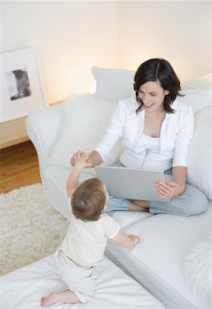 simsearch:700-00865706,k - Woman with Son in Living Room Stock Photo - Rights-Managed, Code: 700-00865698