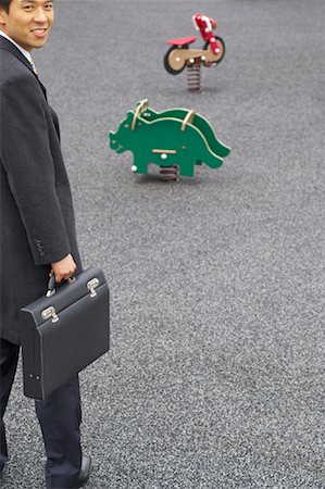 family reminiscing - Businessman at Playground Stock Photo - Rights-Managed, Code: 700-00865993