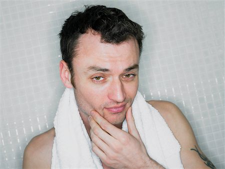 Man Touching Unshaven Face Stock Photo - Rights-Managed, Code: 700-00866699