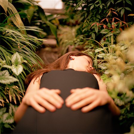 Woman Lying on Path in Garden Stock Photo - Rights-Managed, Code: 700-00867104