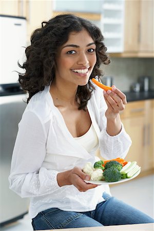 simsearch:700-00426102,k - Portrait of Woman Eating Salad Stock Photo - Rights-Managed, Code: 700-00897426